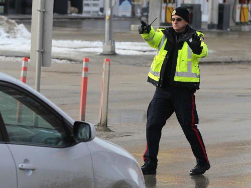 Checking for cell phone offenders. The Winnipeg Police Service set up an operation to enforce the cell phone use while driving laws. One plain clothes cop eye4s people in Osborne Village going northbound and radioed ahead where a few cops would pull the car over and deal with the offense. February 29, 2012  BORIS MINKEVICH / WINNIPEG FREE PRESS