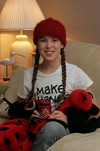 BORIS MINKEVICH / WINNIPEG FREE PRESS  070125 Hannah Taylor poses for a portrait in her home.