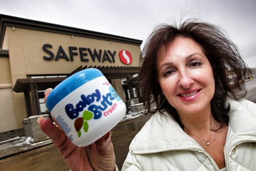 Winnipeg entrepreneur Majda Ficko  in front of a Safeway store with a sample of her Baby Butz all-natural diaper rash cream. Safeway is going to start carrying the cream in all of its Canadian stores within the next four to six weeks. See Murray McNeill story 120301 March 01, 2012 Mike Deal / Winnipeg Free Press