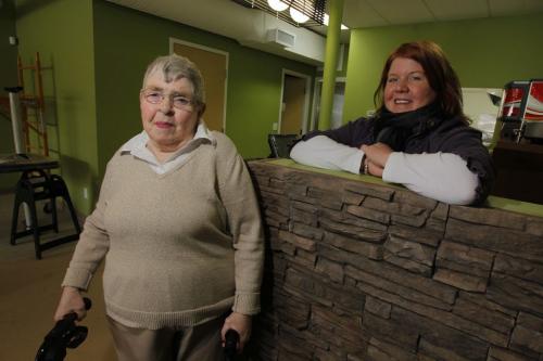 Volunteer Dorothy, who will try cleaning tables when the Cafe opens up, and "'Arche Tova Cafe manager Belinda Squance pose for a photo in the almost ready to open cafe in Transcona. River East Transcona School division opened the cafe and offer work to special needs people in the community March 2, 2012  BORIS MINKEVICH / WINNIPEG FREE PRESS