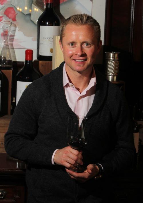 Valeri Bure, former sniper with the Calgary Flames and Florida Panthers, is in town doing some promotional work with his wine company, Bure Family Wines in California  poses for a photo at 529 Wellington restaurant with some of his wine.  March 2, 2012  BORIS MINKEVICH / WINNIPEG FREE PRESS