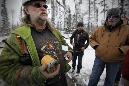 February 24, 2012 - 120224  -  Andrew Cann, field supervisor for Rodren Drilling, shows a diamond bit to potential investors at the Ogama-Rockland Project for Bison Gold Resources Friday February 24, 2012.   John Woods / Winnipeg Free Press