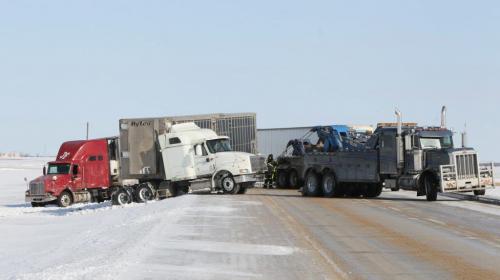 The scene of a four semi-trailer pile-up on the Perimeter Highway north of the Mcgillivray Boulevard. South bound traffic is being redirected on to side roads around the accident.  120303 March 03, 2012 Mike Deal / Winnipeg Free Press