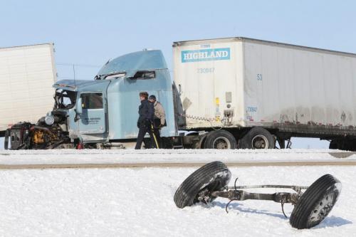 The scene of a four semi-trailer pile-up on the Perimeter Highway north of the Mcgillivray Boulevard. South bound traffic is being redirected on to side roads around the accident.  120303 March 03, 2012 Mike Deal / Winnipeg Free Press