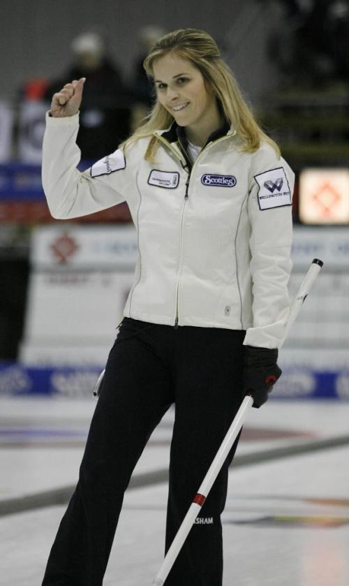 John Woods / Winnipeg Free Press / January 29/07 - 070129  - Jennifer Jones raises her arm in the 10th end of the Scotties Tournament of Hearts in Morris Sunday, Jan 28/07.   She defeated her opponent Darcy Robertson 9-6.