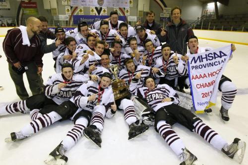 March 12, 2012 - 120312  -   St Paul's Crusaders celebrate a win over the Kelvin Clippers in the the 2012 Provincial AAAA Boys' High School Hockey Championship Monday March 6, 2012. John Woods / Winnipeg Free Press
