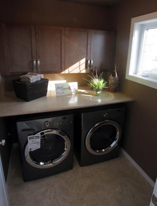 SHOW HOME - 64 Shady Shores Drive in Waterside Estates. Upstairs laundry room. Kensington Homes.  March 13, 2012  BORIS MINKEVICH / WINNIPEG FREE PRESS