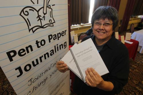 Pen to Paper Journaling. Leona Daniels with the journals. March 15, 2012  BORIS MINKEVICH / WINNIPEG FREE PRESS