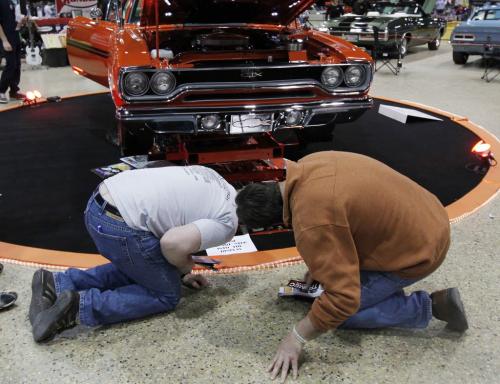 March 17, 2012 - 120318  -   Rob Nagy and Jae Potvin check out a car at the World of Wheels at the Convention Centre Sunday March 18, 2012.    John Woods / Winnipeg Free Press