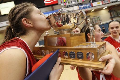 March 19, 2012 - 120319  -  Glenlawn Lions Emily Potter (10) kisses the cup. Glenlawn Lions win the 2012 AAAA High School Basketball championship over the Oak PArk Raiders Monday March 19, 2012.    John Woods / Winnipeg Free Press