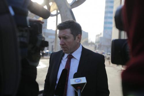 Sheldon Kennedy arrives at the law courts building and talks to media and non media people.  March 20, 2012  BORIS MINKEVICH / WINNIPEG FREE PRESS