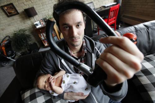 March 20, 2012 - 120320  -  Jacques Marcoux and his newborn daughter Amélie are photographed with the cut u-lock that once locked his stolen bike Tuesday March 20, 2012. Marcoux was visiting his girlfriend and baby at St. Boniface Hospital when his bike was stolen. John Woods / Winnipeg Free Press