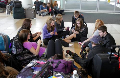 Students from Carberry Collegiate wait for their flight to Toronto, which was cancelled because of the wildvcat strike in Toronto by Air Canada employees. They were going to Greece over spring break for a class trip.  March 23, 2012  BORIS MINKEVICH / WINNIPEG FREE PRESS