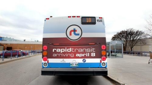 Photo of Winnipeg Transit Bus with rapid transit ad on side. See Kives story on rapid transit.. March 24 2012 (Ruth Bonneville/Winnipeg Free Press)