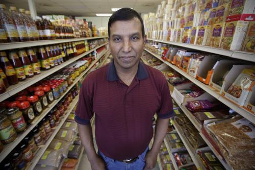 Nizamuddin Khan owner of Meghna Grocery is photographed in his store in Winnipeg on Sunday, March 25, 2012. (John Woods / Winnipeg Free Press)  Re: Bart story