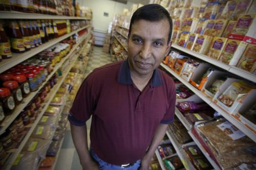 Nizamuddin Khan owner of Meghna Grocery is photographed in his store in Winnipeg on Sunday, March 25, 2012. (John Woods / Winnipeg Free Press)  Re: Bart story