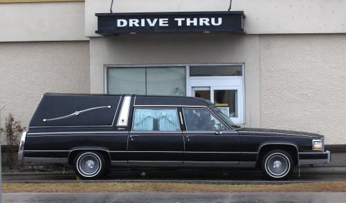 Dying for Lunch-A hearse waits at the Kentucky Fried Chicken outlet drive through at Notre dame and Sherbrook Ave Tuesday- Standup Photo- March 27, 2012   (JOE BRYKSA / WINNIPEG FREE PRESS)