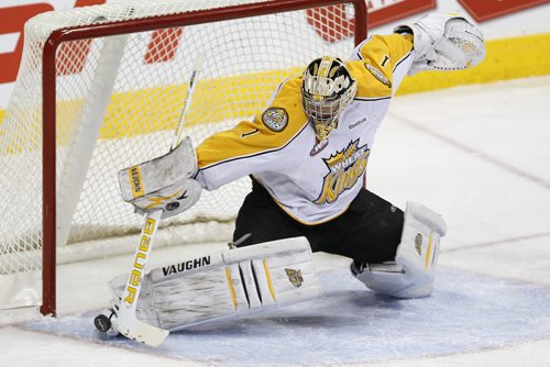 March 27, 2012 - 120327  -  Brandon Wheat Kings' Corbin Boes (1) makes the toe save against the Calgary Hitmen in the first period of their WHL playoff game in Winnipeg Tuesday March 27, 2012.    John Woods / Winnipeg Free Press