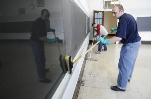 John Woods / Winnipeg Free Press / February  2 2007 - 070202  - On Friday, Feb., 2/07 Grzegorz Chmurzynski (R) and Glen Sutherland, custodians with the Winnipeg School division, wash the blackboards and the floors at Sir Sam Steele School on Nairn in preparation for students who can not attend their school because of flooding.