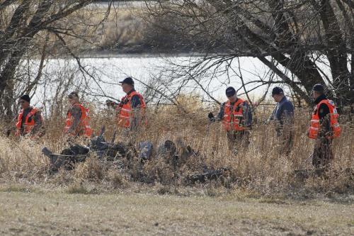 April 1, 2012 - 120401  -  RCMP Search and Rescue search the east bank of the Red River just north of the highway 4 bridge Sunday April 1, 2012. Remains were found at the location yesterday and today. John Woods / Winnipeg Free Press