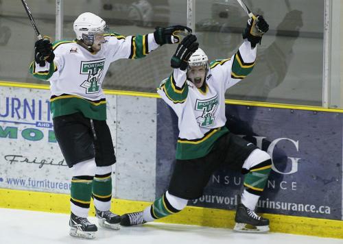 April 1, 2012 - 120401  -  Portage Terriers' Brendan Harms (18) celebrates his goal against the Winnipeg Saints with an unidentified player in game one of the MJHL Turnbull Cup in Portage La  Prairie Sunday April 1, 2012.  John Woods / Winnipeg Free Press