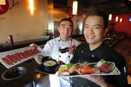 FOOD REVIEW - IGI BBQ & SUSHI BISTRO. Dee Chan and David Kong with some favorable dishes reviewed this week in the paper. Included is Chawanmushi (in bowl) and lots of Sushimi(inc. albicore, Big eye tuna, and Yellowtail). April 3, 2012  BORIS MINKEVICH / WINNIPEG FREE PRESS
