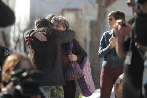April 3, 2012 - 120403  - A couple embrace at a vigil Tuesday April 3, 2012 for Carolyn Marie Sinclair and her unborn baby who were found murdered and dumped in a backlane on the 700 block of Notre Dame Avenue Saturday March 31, 2012.  John Woods / Winnipeg Free Press