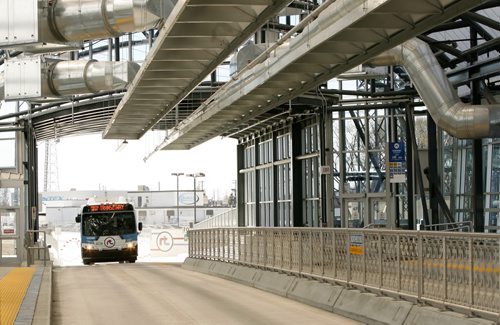 A rapid transit bus arrives at the Osborne Street Station on the opening day of the Southwest Transitway. 120405 - Thursday, April 05, 2012 -  (MIKE DEAL / WINNIPEG FREE PRESS)