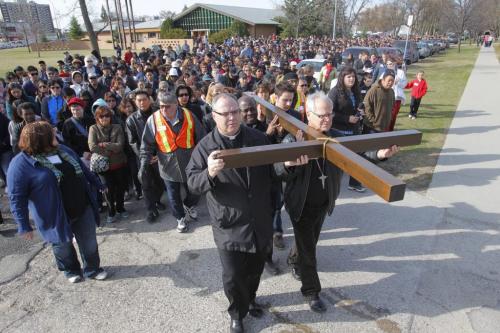 Way of the Cross - St. Vital Roman Catholic Church at 1629 Pembina Hwy. They marched with a cross through the neighbourhood. April 6, 2012  BORIS MINKEVICH / WINNIPEG FREE PRESS