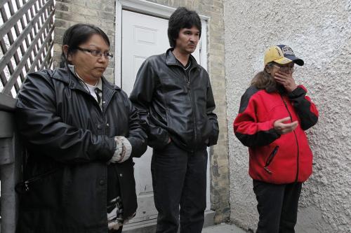 April 7, 2012 - 120407 - (L to R) Iva Abraham (sister in law of Allan Crockford), James Bussidor (brother of Allan Crockford), and Harriett Abraham-Crawford, wife of Allan Crockford talks to media outside their home Saturday April 7, 2012. Crockford was murdered on Maryland Friday morning. John Woods / Winnipeg Free Press
