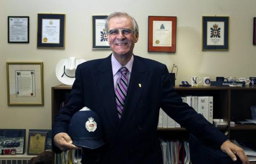 Manitoba Chambers of Commerce  president Graham Starmer with his  Bobbys hat from his earlier career as a police constable in England.  Murray McNeill story (WAYNE GLOWACKI/WINNIPEG FREE PRESS) Winnipeg Free Press  April 12 2012