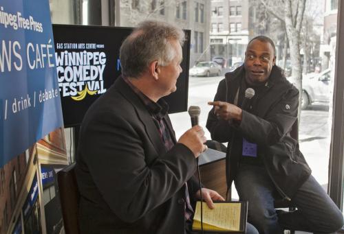 04-12-12 - Sound effects wizard Michael Winslow, of Police Academy and Spaceballs fame, goofs off on stage with Free Press entertainment writer Brad Oswald during a Winnipeg Comedy Festival chat at the WInnipeg Free Press News Cafe on Thursday. Melissa Tait / Winnipeg Free Press