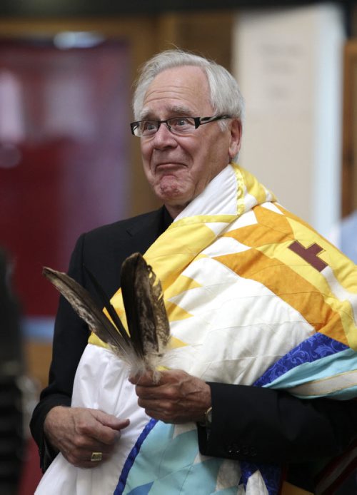 James Weisgerber, the Archbishop of Winnipeg, reacts to a joke made by Wab Kinew who conducted a ceremony at the Thunderbird House. Anishinaabe elders and community leaders Tobasonakwut Kinew, Fred Kelly, Phil Fontaine and Bert Fontaine adopted James in a traditional "Naabagoondiwin" adoption ceremony.  See Nick Martin story 120414 - Saturday, April 14, 2012 -  (MIKE DEAL / WINNIPEG FREE PRESS)