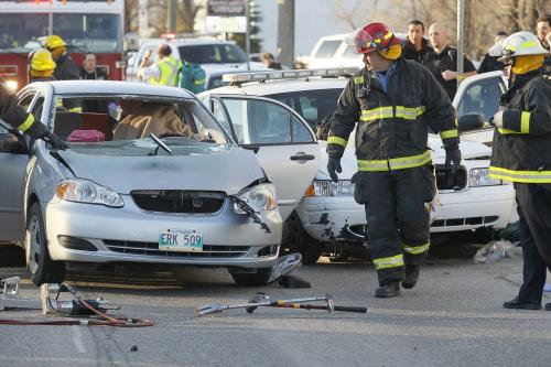 April 16, 2012 - 120416  -  On Archibald at Cote on Monday, April 16, 2012 police and emergency personnel were called to the scene of a MVC between a car and a police cruiser. Several people were taken to hospital. John Woods / Winnipeg Free Press