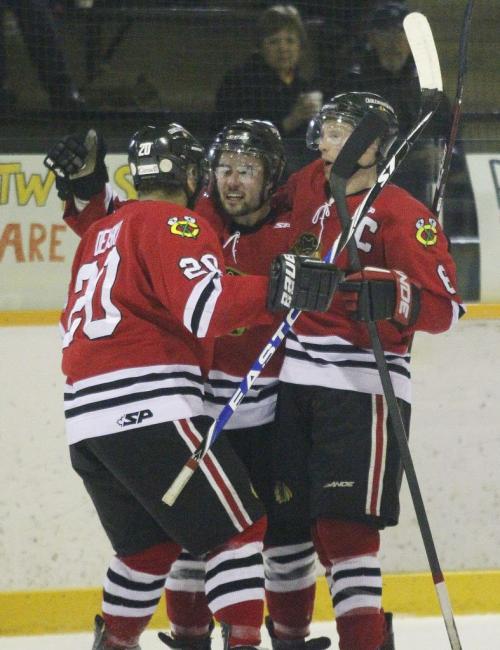 April 17, 2012 - 120417  - Charleswood Hawks Nic Demski (20), Brody Warren (26), and Dillon Smith (6) celebrate Warren's goal against the Fort Garry Twins in game five of the MMJHL finals at Eric Coy Arena Tuesday, April 17, 2012.   John Woods / Winnipeg Free Press