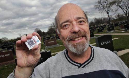 Lorne Raber from Eden Memorials with a QR device that can be attached to tombstones. See Gord Sinclair story.  120418 April 18, 2012 Mike Deal / Winnipeg Free Press