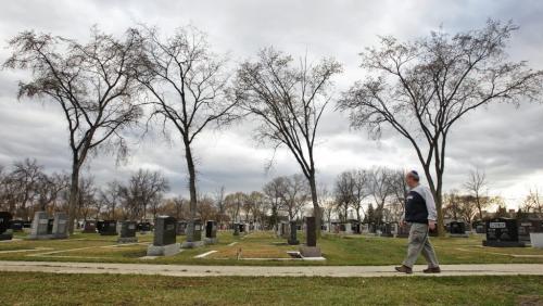 Lorne Raber from Eden Memorials with a QR device that can be attached to tombstones. See Gord Sinclair story.  120418 April 18, 2012 Mike Deal / Winnipeg Free Press