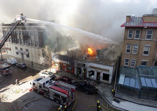 Downtown fire 44 Albert ,  St War on Music  store -heavy smoke and fire damage , historic buildings ( left) St Charles Hotel  and (right)  Royal Albert Hotel with Ken Hong Resturant sharing wall with War on Music  store   KEN GIGLIOTTI  / WINNIPEG FREE PRESS  / April 19 2012