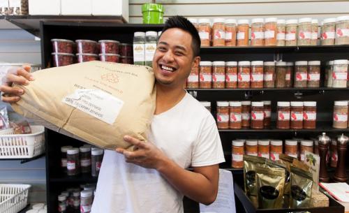 Aaron Delos Santos and his family own and manage the Spice World store on Marion in St. Boniface.  Story by Maureen Scurfield Sunday Xtra 120420 - Friday, April 20, 2012 -  Melissa Tait / Winnipeg Free Press