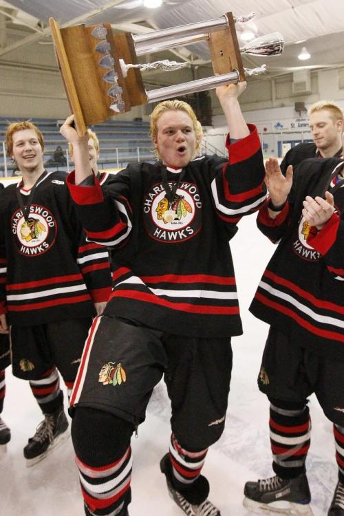 April 120, 2012 - 120420  - Charleswood Hawks Jesse Toth (19) and teammates celebrate their championship win over the Fort Garry Twins in game six of the MMJHL finals at St James Civic Centre Friday, April 20, 2012.   John Woods / Winnipeg Free Press