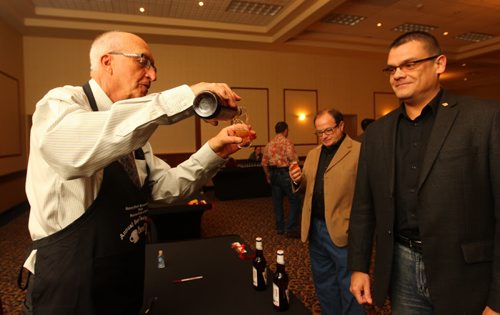Brandon Sun Brandon Rotary Sunset club's Bill Taylor pours out a glass of polish beer, one of 15 different bands, which were featured at the club's first annual Brandon Beer Festival held in partnership with the Rotarac club on Saturday evening in the Imperial Ballroom at the Victorian Inn. (Bruce Bumstead/Brandon Sun)
