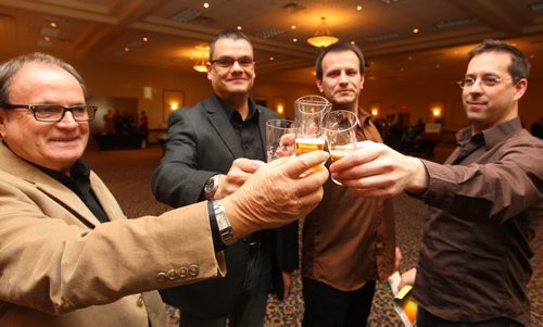 Brandon Sun Stan Fraser, Rob Lussier, Dale Fraser and Joel McCrimmon toast the beer selections to kick off the Rotary Club of Brandon Sunset and Rotarac's first annual Brandon Beer Festival held in the Imperial Ballroom on Saturday night. (Bruce Bumstead/Brandon Sun)