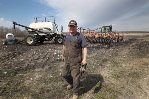 Keystone Agriculture Producers president DOUG CHORNEY prepares equipment to fertilize and seed in his grain field- See Murray McNeil Story- Apr 24, 2012 (JOE BRYKSA / WINNIPEG FREE PRESS)