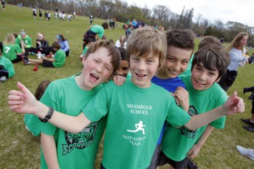 School kids from Shamrock School in Assiniboine Park, near Lyric Theatre, getting fired up for Manitoba Marathon at the annual kick-off celebration event. Cameron chackowsky, second from left, is supported by his buddies Blake Treffner, Johnathon Andromidas, and Cristian Calamusa. CAMERON IS IN ASHLEY STORY. April 25, 2012  BORIS MINKEVICH / WINNIPEG FREE PRESS