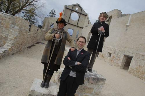Shakespeare in the Ruins at The Trappist Monastery Provincial Park and restored Ruins. Michelle boulet Sarah constible with swords and Kevin Klassen (in the suit) pose for a photo in the ruins where the play will be. April 27, 2012  BORIS MINKEVICH / WINNIPEG FREE PRESS