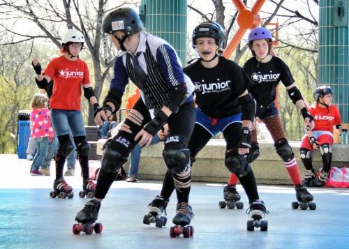 Kasia Dyszy "jazzberry ram" (left) and Emilie Beaudry-Levesque "French fry" ham it up during the Winnipeg Roller Derby League open house at the Forks Saturday afternoon.  120428 April 28, 2012 Mike Deal / Winnipeg Free Press