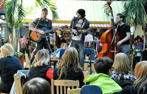 Members of the band Flat City Folk (l-r) Phil Brake, Donovan Locken and Lee Froese perform at the Forks in a effort to win a coveted buskers pass which will allow the trio to busk at the Fork this year.   120428 April 28, 2012 Mike Deal / Winnipeg Free Press