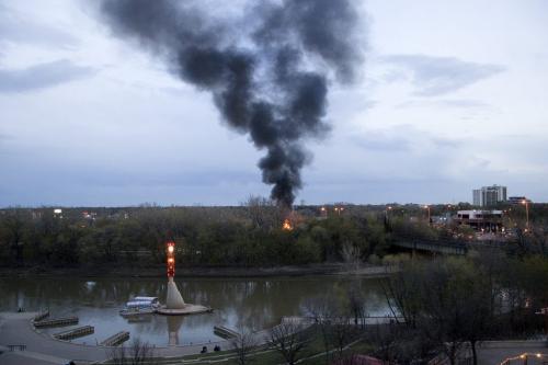 April 30, 2012 - 120430  -   Firefighters were called to extinguish burning docks which were being stored at The Forks Monday April 30, 2012.  The same docks were set on fire last week. Andrea Boychuk for the Winnipeg Free Press