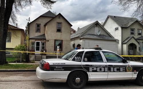 Winnipeg Police Officers at 854 Home Street where a deceased person was discovered Tuesday afternoon.  120501 May 01, 2012 Mike Deal / Winnipeg Free Press