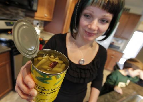 May 1, 2012 - 120501  - In her Oakbank home Tuesday May 1, 2012 Krystal Boyce-Gaudreau shows off a can of Superstore No-Name brand green beans and a grasshopper which she found in the beans when she opened the can for her family's meal on Sunday.    John Woods / Winnipeg Free Press